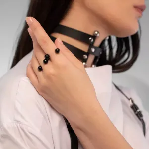 A Stunning Ring Black Balls