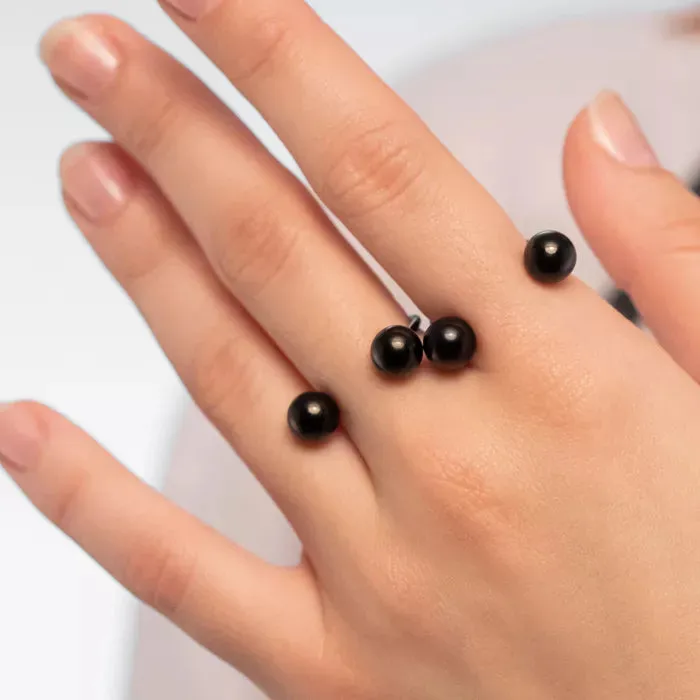 A Stunning Ring Black Balls