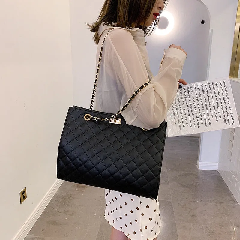 Black rectangular padded Handbag