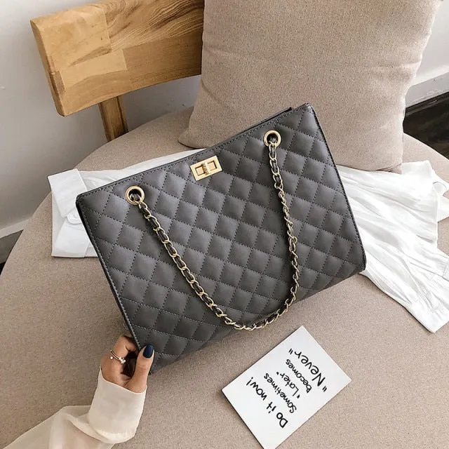Black rectangular padded Handbag
