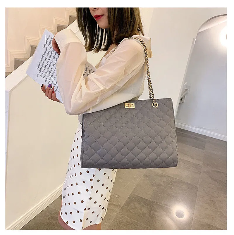 Black rectangular padded Handbag