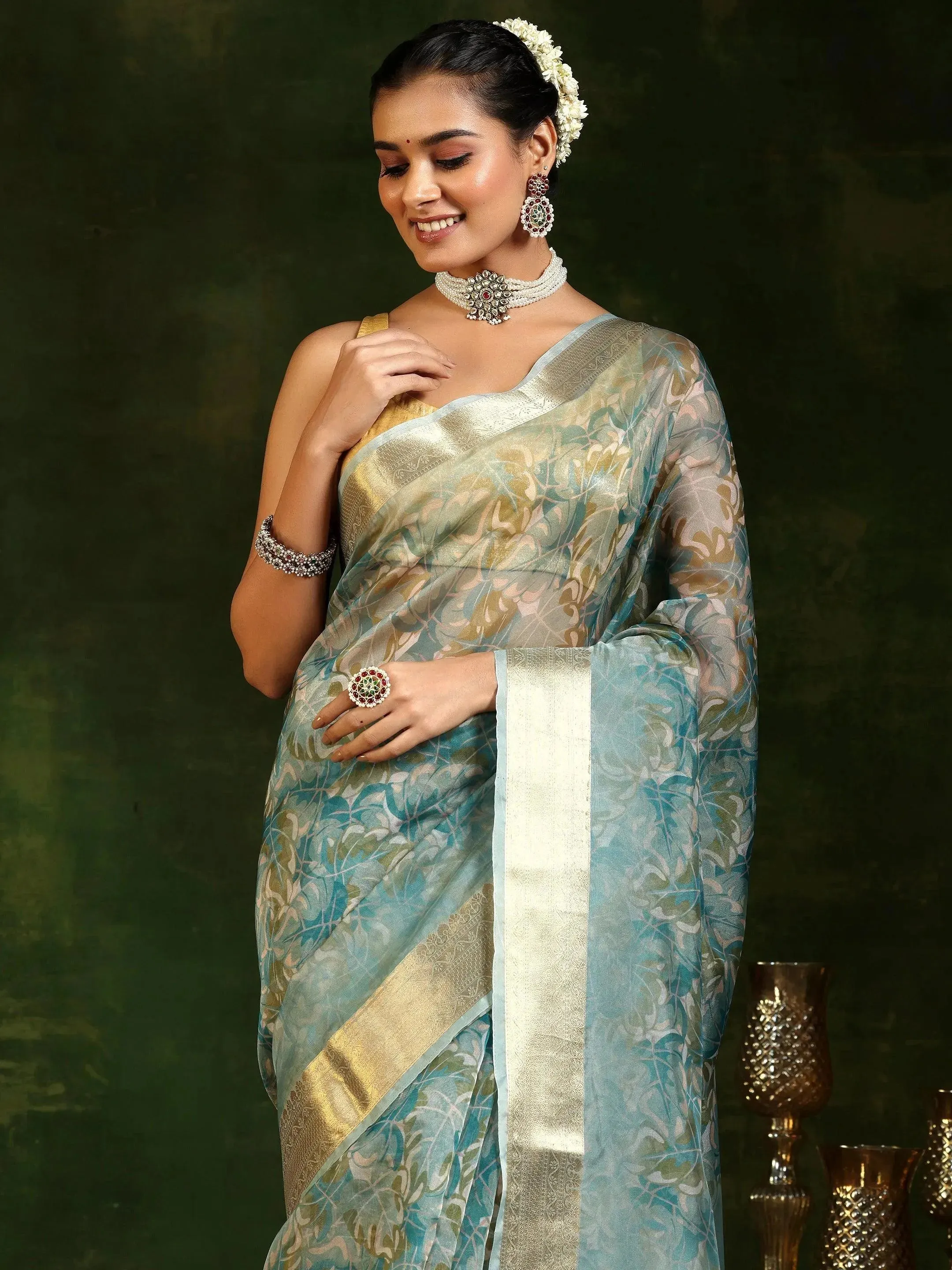 Turquoise Printed Organza Saree With Unstitched Blouse Piece
