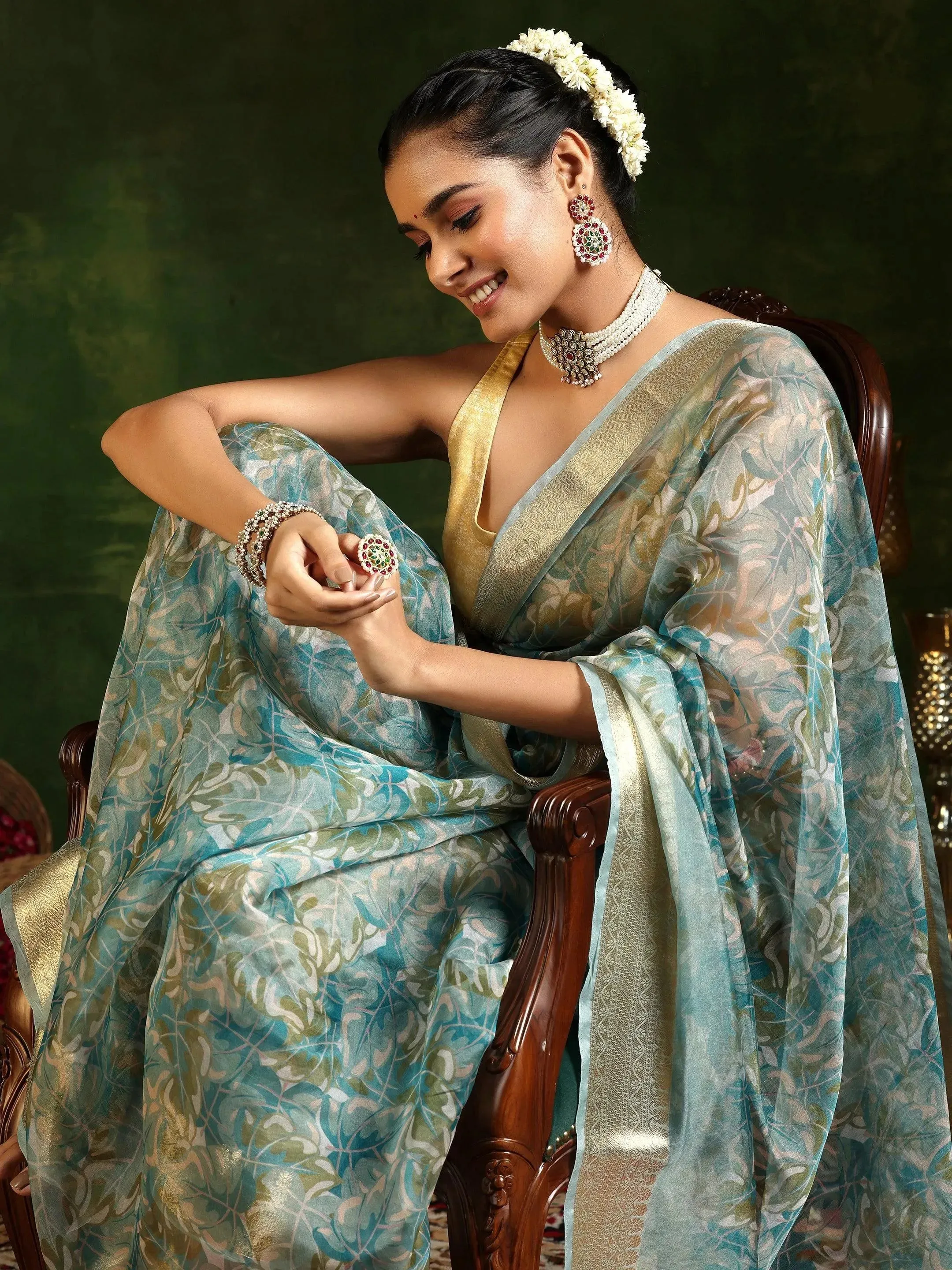 Turquoise Printed Organza Saree With Unstitched Blouse Piece